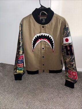 Hudson Jeans Khaki Varsity Jacket with Camo Sleeves and Shark Patch